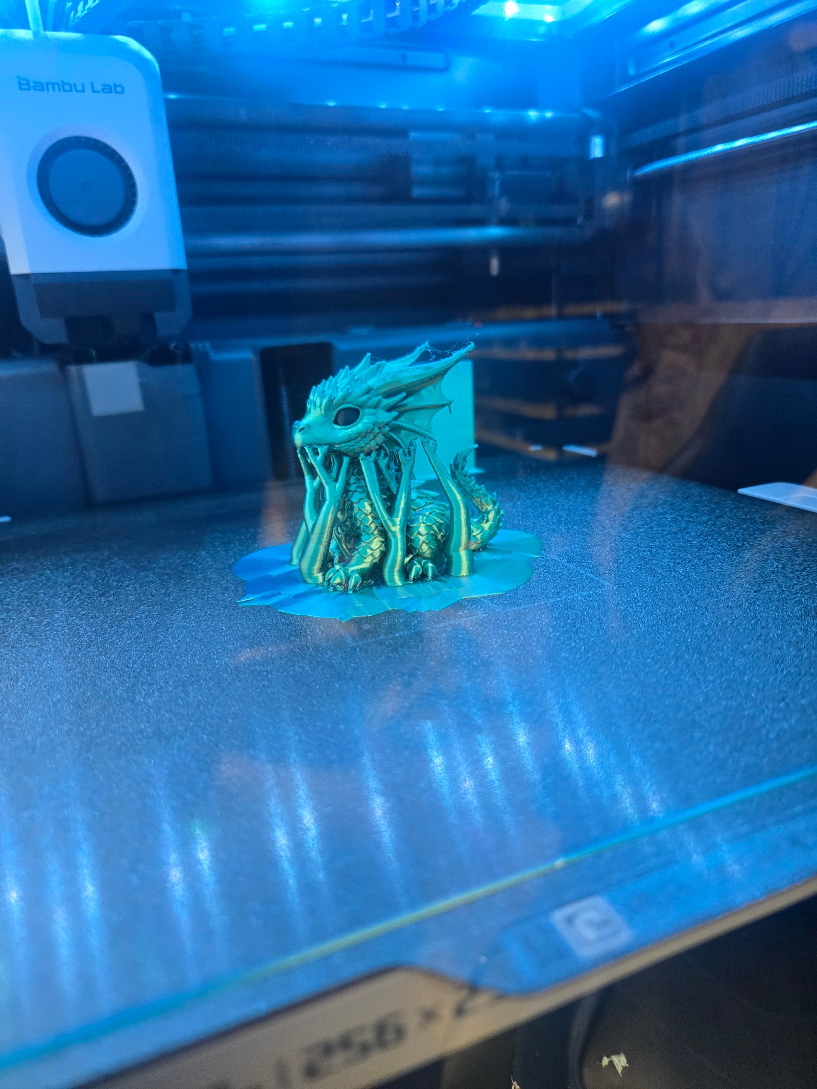 Dragon figurine on the print bed